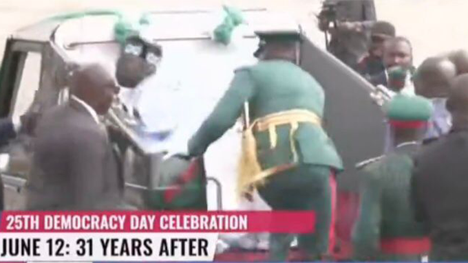 Tension As President Tinubu Falls, Hits Head On Parade Vehicle During Democracy Day