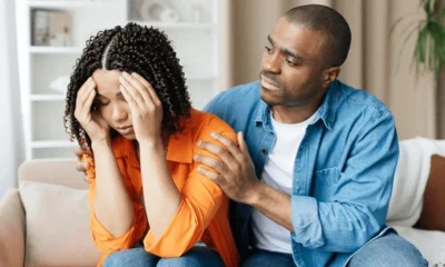 compassionate black man comforting