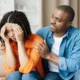 compassionate black man comforting