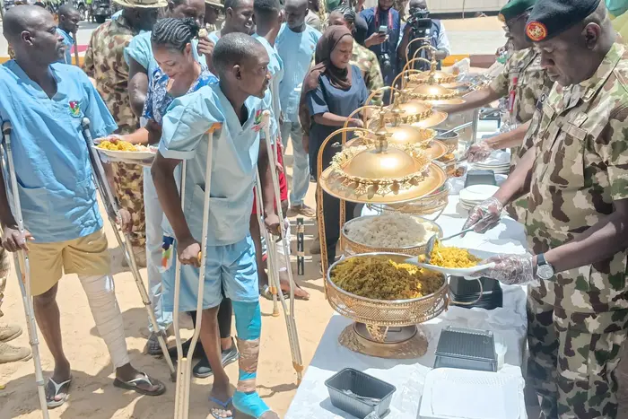 Emotional Photos Emerge as Nigerian Army Celebrates Soldiers Injured in Battle