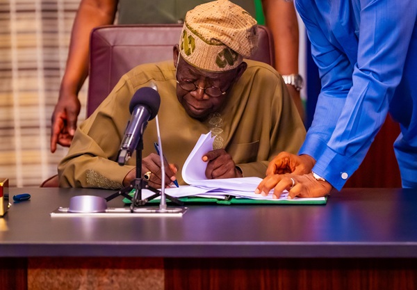 tinubu signs 2